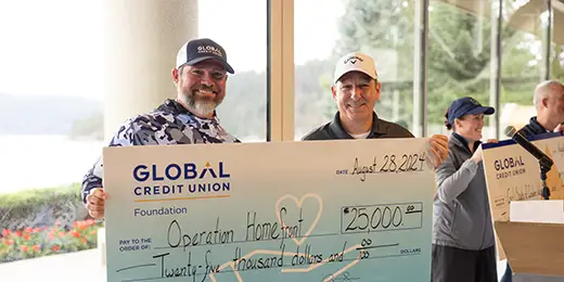 Foundation Fairway Friends Golf Tournament presenting a giant check