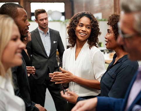 group of business people in a circle talking