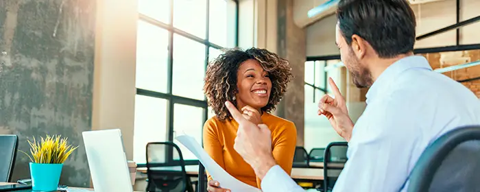 having conversation with her financial advisor