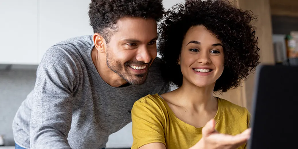 Couple looking at computer